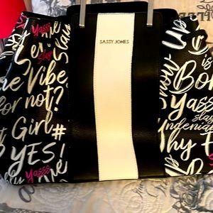 Authentic Sassy Jones handbag. Pink Black and White